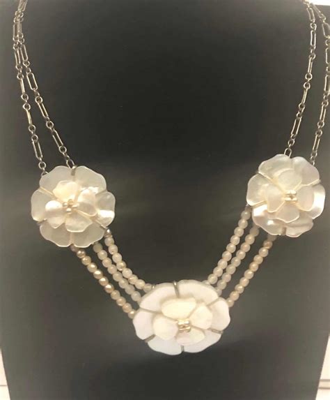 chanel camellia flower necklace.